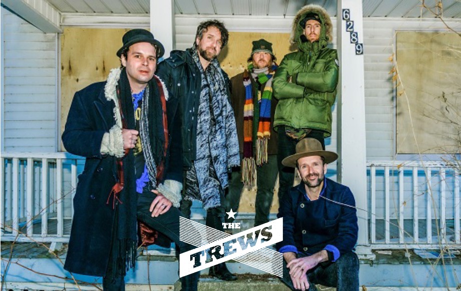 The Trews on front porch with band logo